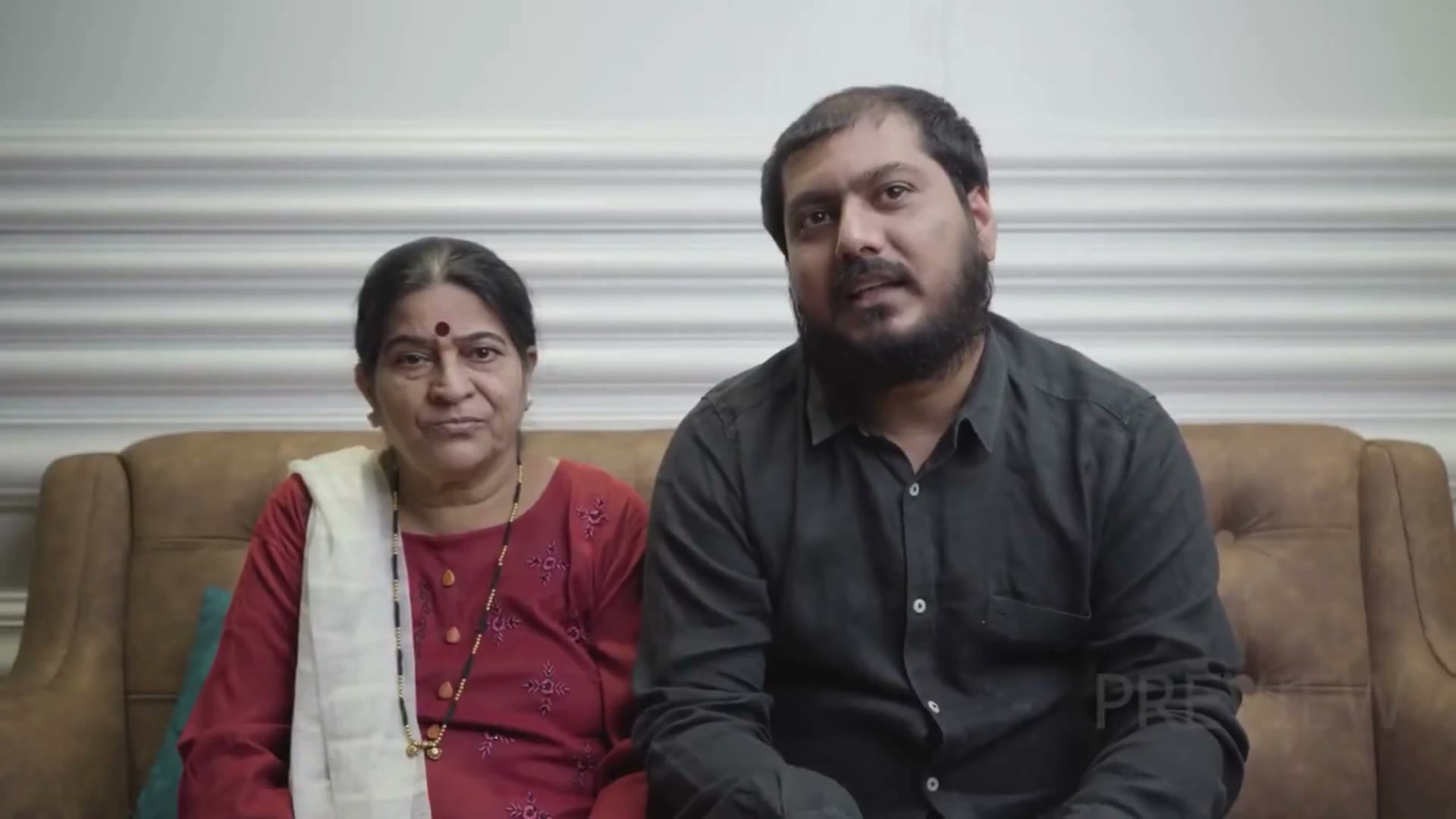 Abhijit and Usha Khandalkar at home