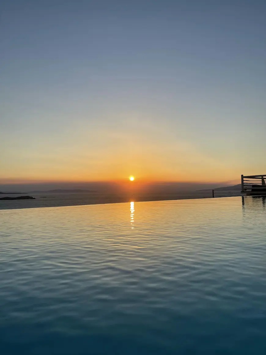 The rooftop pool at TRU Gardenia at sunset